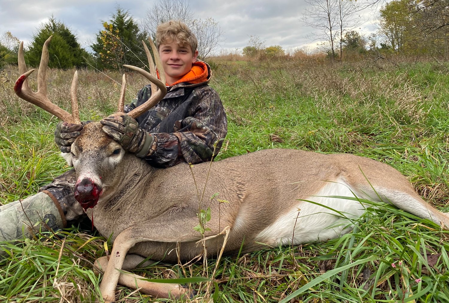 Luke Moore, 12, son of Brian and Kim Moore, brought down an 8-point buck with a 6.5 Creedmoor from 105-yards.